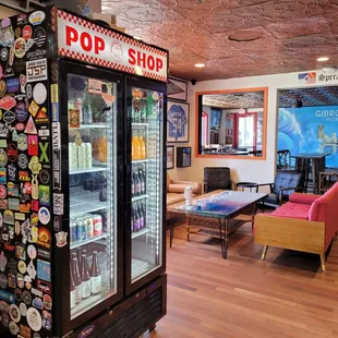 Pop Shop with beers to-go, Faygo, Vernor's, apple juice, and other goodies.