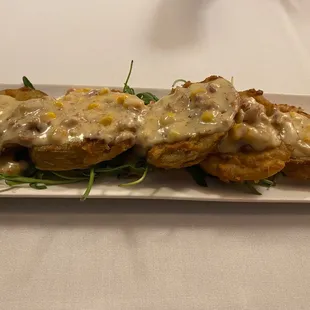 Fried green tomatoes appetizer.  Great and different topping.
