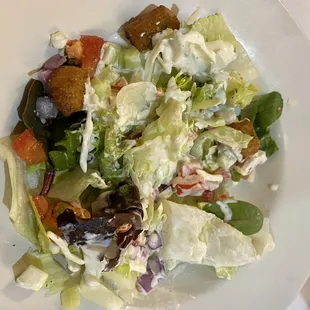 Partially eaten salad.