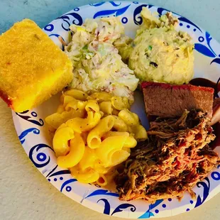 &quot;The Plate&quot; - smoked brisket, pulled pork, macaroni &amp; cheese, green chili cornbread, apple slaw, potato salad