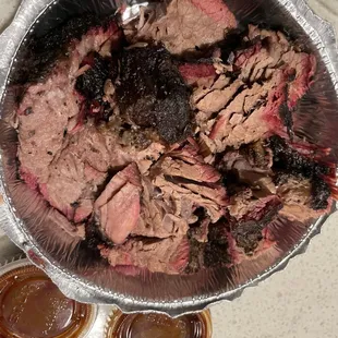 1 pound of Beef Brisket! 2 Spicy BBQ sauces.