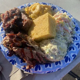 Smoked brisket, pulled pork, potato salad, coleslaw, Mac and cheese