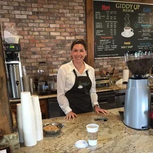 a woman behind a counter