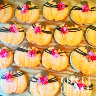 a tray of decorated cookies