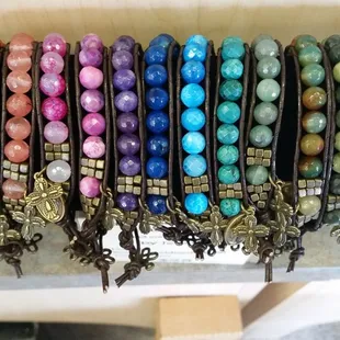 Hand crafted with leather and polished stone bead bracelets.