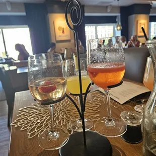 two glasses of wine and a decanter