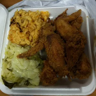 Large fried chicken wing platter with Mac and cheese and cabbage