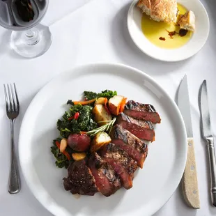 a plate of meat and vegetables