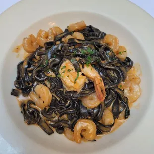 Home made Squid ink tagliatelle with shrimp