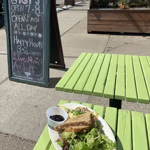 a sandwich and salad on a plate