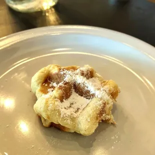 Nice touch - the server brings you a tiny sampler waffle, compliments of the house!