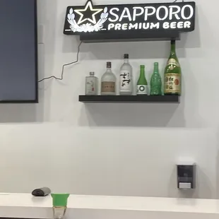 Behind sushi bar