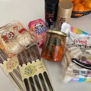 Chopsticks, rice cakes, dumplings, snacks, BTS iced coffee, and that amazing kimchi (we got cucumber kimchi this time)