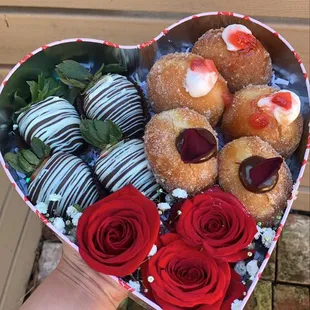 Valentine&apos;s Day Mix tin: 4 chocolate covered strawberries, 5 mini doughnuts and 3 roses.
