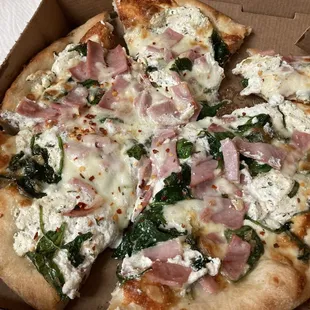 White pizza with garlic spinach