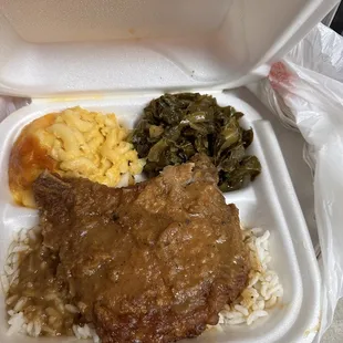 a meal in a styrofoam container