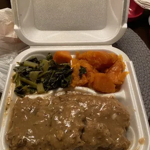 Cube stake plate with gravy,  white rice, collards and yams.