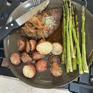 BAYOU BLACKENED STEAK with asparagus and red potatoes.  Great flavor!