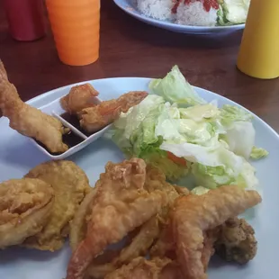 Tempura, and spicy garlic chicken in the back. :)