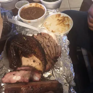 My husband had the please to 3 Meat BBQ Dinner, brisket, chicken and ribs were very tender. BBQ sauce was delicious we wished we had more.