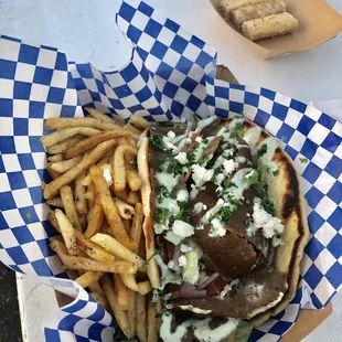 My dinner = gyro sandwich w/ seasoned fries. Baklava for desert. Rating: Typical.