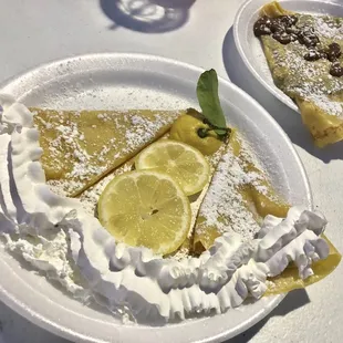 Foreground: lemon crêpe (pretty good); background: Nutella crêpe (typical).