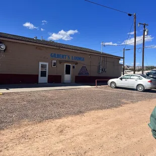 a car parked in front of it