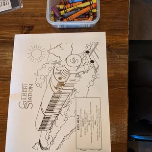 Kids menu and a box of crayons