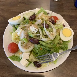 Small side salad they dressed up for me like their huge Greek salad.