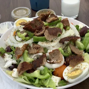 Greek salad with added gyro meat. I ate most of the meat before the picture. Lol! This salad makes 2-3 meals for me.