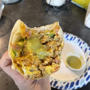 Arlington breakfast burrito with their thick green sauce