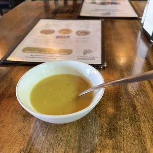 a bowl of soup on a table