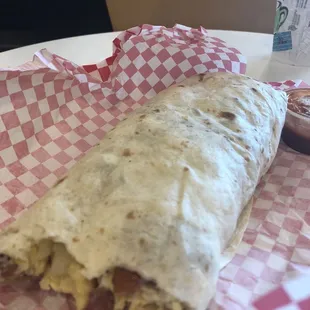 Bacon, egg, potato, and cheese breakfast burrito