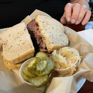 a sandwich and pickles
