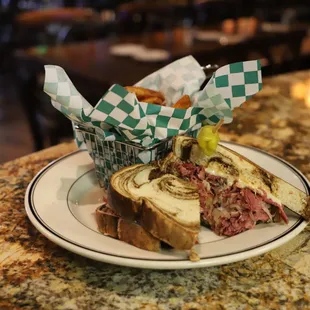 a pastrami sandwich on a plate