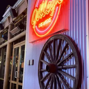 a wagon wheel outside a restaurant