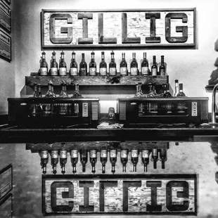 a bar with bottles of wine