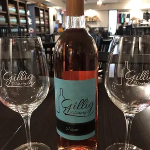 two wine glasses and a bottle of wine