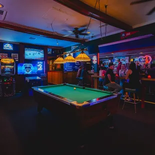 a pool table in a bar