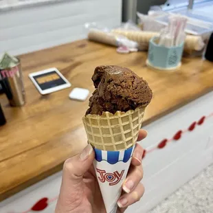 One scoop ice cream waffle cone