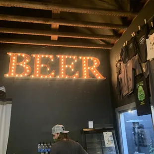  man standing in front of the bar