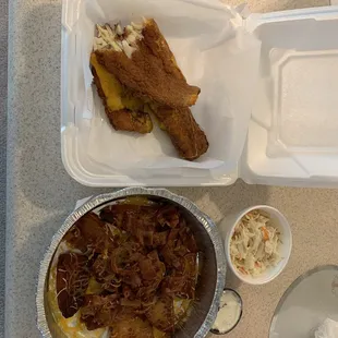 a meal in a styrofoam container
