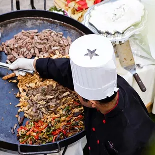 Chefs at work preparing delicious meals at Gil's Elegant Catering in Dallas TX.