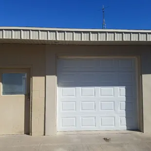 Shop entrance parking in back of shop.