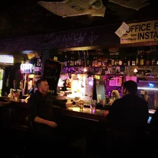 people sitting at the bar