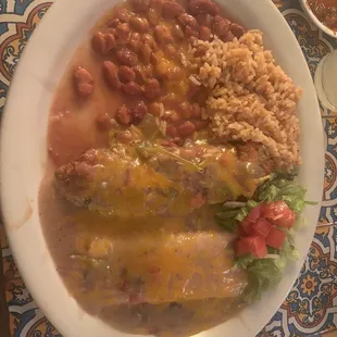 Green Chili relleno and cheese enchilada with ranchero beans and rice.