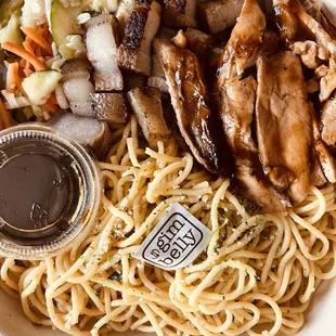 a bowl of noodles and meat