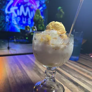 a sundae with ice cream and bananas
