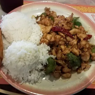 Kung pao lunch special with white rice and egg roll.