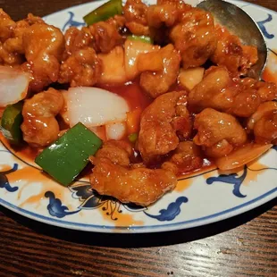 sweet and sour chicken $14.50...rice $2.75 for 1 serving...